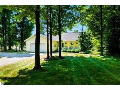 Home For Sale in Kewadin, Michigan