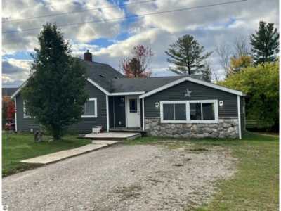 Home For Sale in Kewadin, Michigan